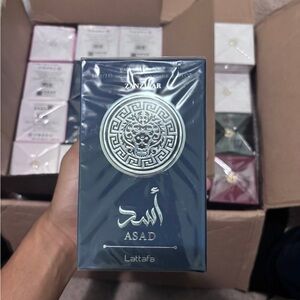 Lattafa Asad blue and Gold Perfume